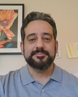Head shot of Maz Ghorban