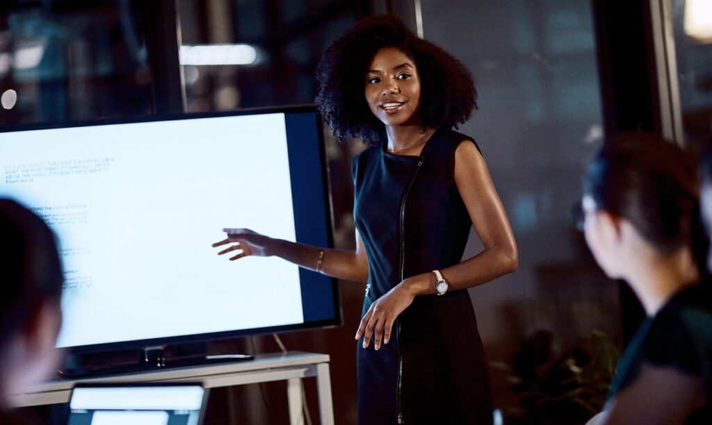 woman introducing a new technology to her team